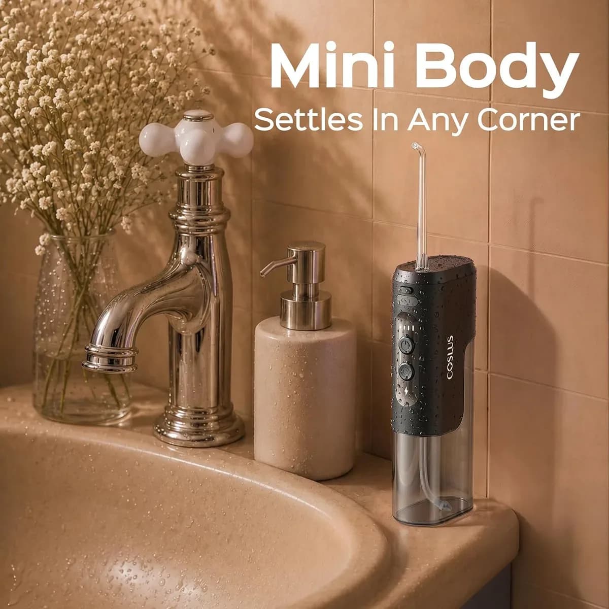 Travel water flosser standing on a bathroom counter