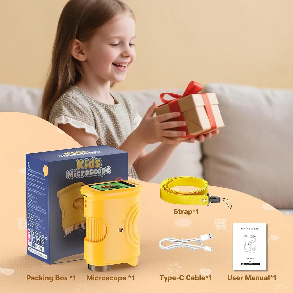 Girl unboxing her new digital microscope for kids