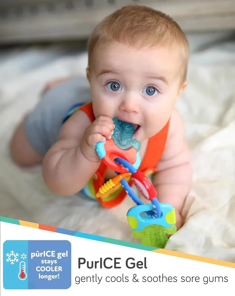 Baby holding the cooling teether keys by the ring