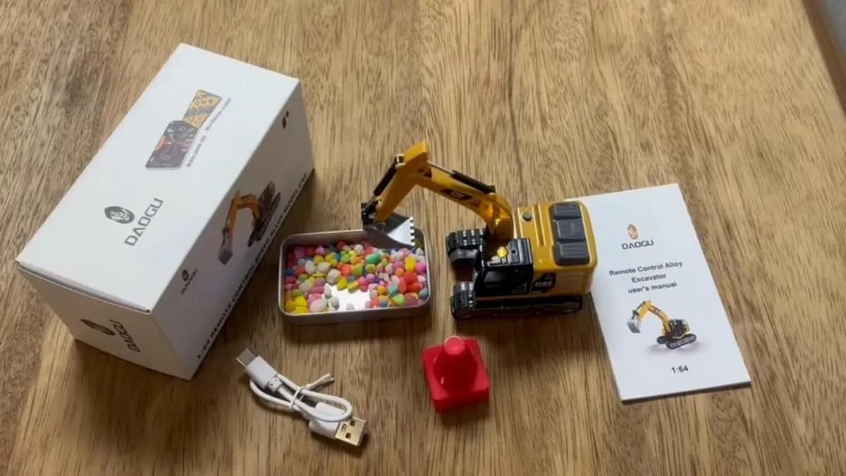 Mini RC excavator package contents with barricades