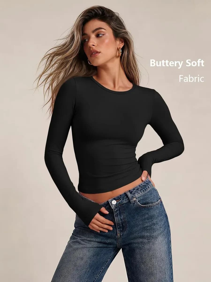 Woman wearing a long sleeve fitted t-shirt with jeans