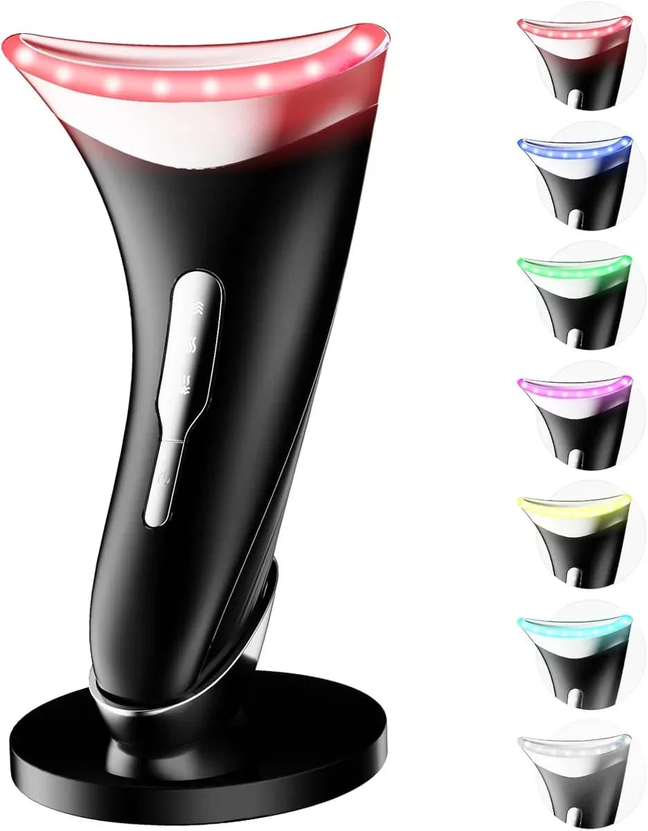 Glossy black LED face massager standing on a charging stand