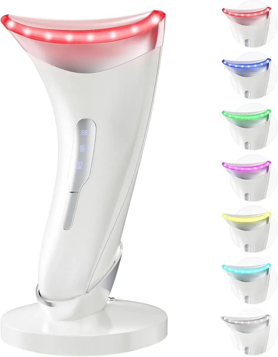 Glossy white LED face massager standing on a charging stand