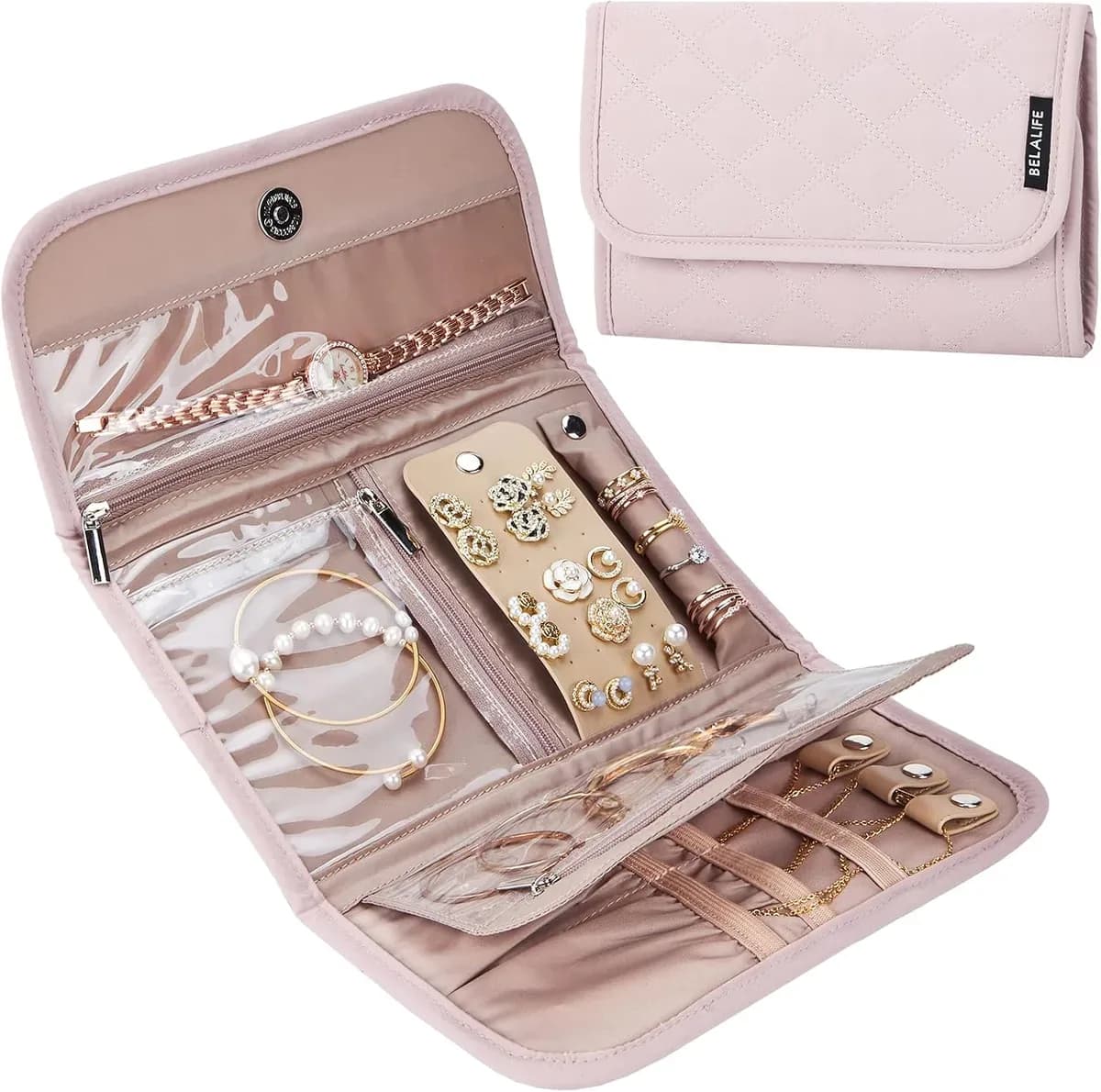 Peach pink jewelry roll organizer shown open and folded